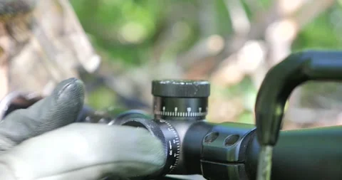 The sniper adjusts the precision of the sweat scope. Stock Footage 139063077
