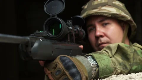 Sniper aiming from the window close-up Stock Footage 158891704