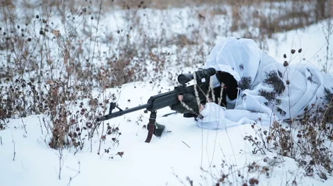 Camouflaged sniper lying in forest and aiming through his scope Stock Photo  by ©Nesterenko_Max 89112398