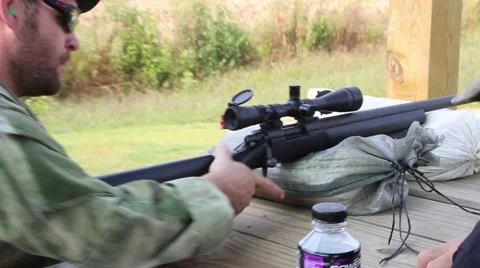 Sniper Chambers a Round and then Aims at Target Vidéo 44188825