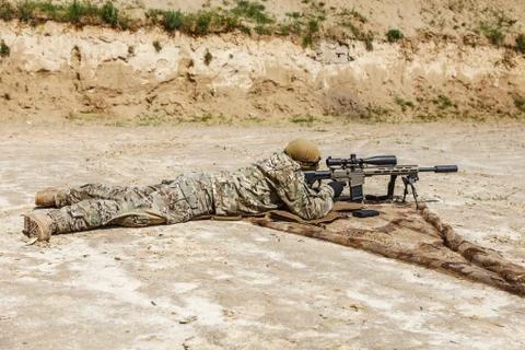 Sniper in the desert Stock Photos