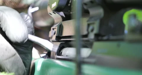 The sniper jerks the bolt. Slow motion. Stock Footage 139063226