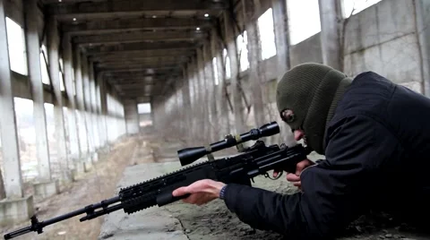 A sniper in the mask shoots lying. Stock Footage 62559481