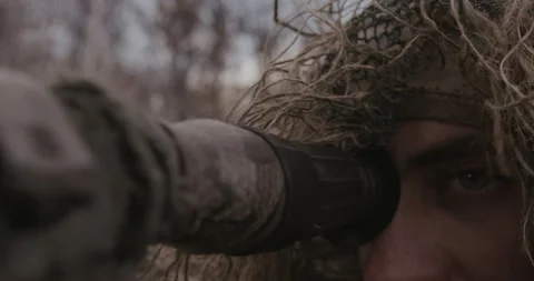 The sniper is in position and prepares to fire.  Stock Footage 153626375