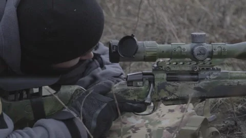 Sniper prepares to shoot. 스톡 동영상 267317273