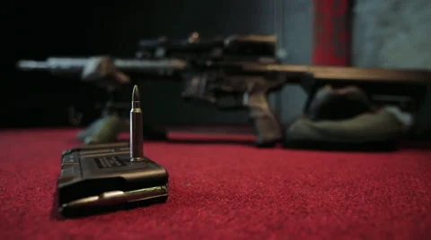 Sniper riffle on red Stock Footage 66106967