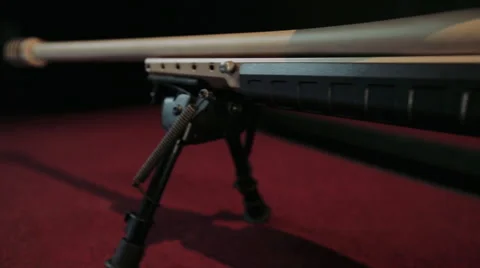 Sniper riffle on red Stock Footage 66107607
