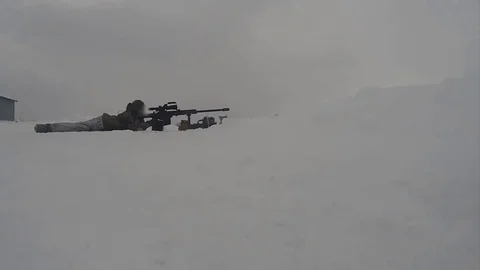 Sniper shooting in winter, slow motion Stock Footage 120834155