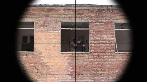Sniper shot in an armed terrorist 3 Vídeos de archivo 46876301