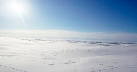 Snomobiling in the tundra. Stock Footage 99641754