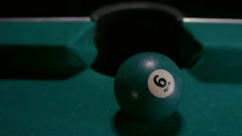Snooker ball with number 6th get into the billiard pocket Stock Footage 85898951