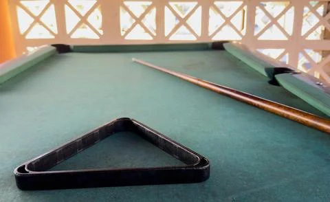 Snooker billiard table, cue on the table, playroom Stock Photos