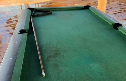 Snooker billiard table, cue on the table, playroom Stock Photos