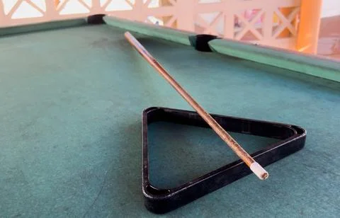 Snooker billiard table, cue on the table, playroom Stock Photos