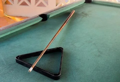 Snooker billiard table, cue on the table, playroom Stock Photos