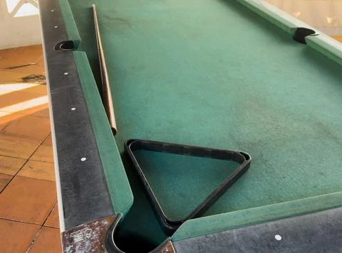 Snooker billiard table, cue on the table, playroom Stock Photos