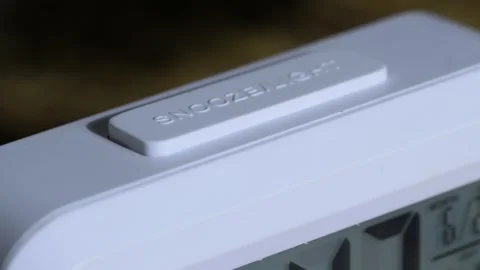 Snooze light clock closeup shot Stock Footage 280747081