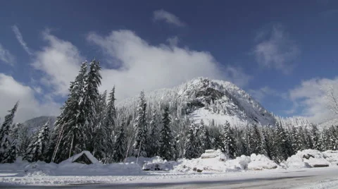 Snoqualmie Time Lapse Snow Mountains Trees Clouds 1 Stock Footage