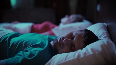 Snoring man. Couple in bed Stock Footage 60056855