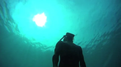 Snorkeler going up for air. Video stock 56566896