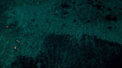 Snorkelers Exploring Waters at Taino Beach, Freeport Bahamas Aerial View Stock Footage 90706286