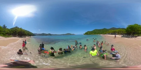 Snorkeling group getting ready (Super wide angle 360 virtual reality) Video stock 105681164