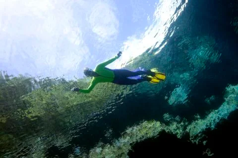 Snorkeller with reflections 写真素材