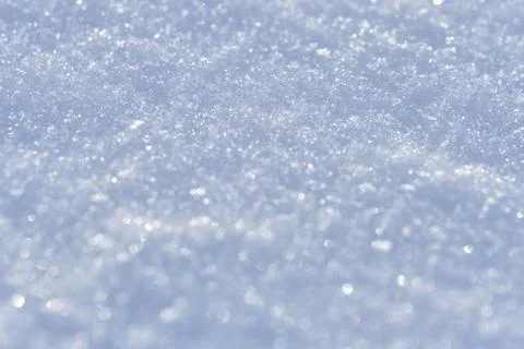 Snow after wind forms white canvas swirling patterns. Light, sparkling, wit.. Foto stock