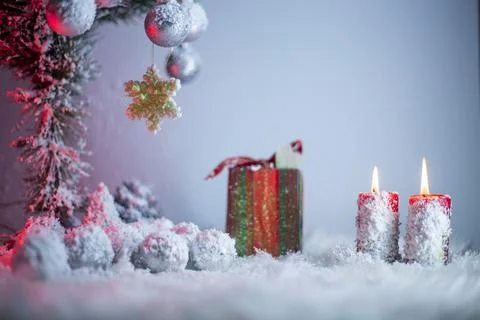 Snow and candle Stock Photos