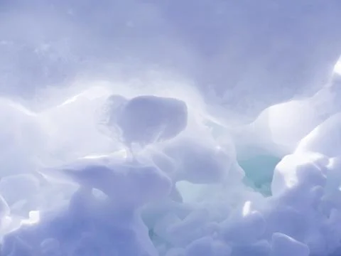 Snow and ice block with rounded forms Photos