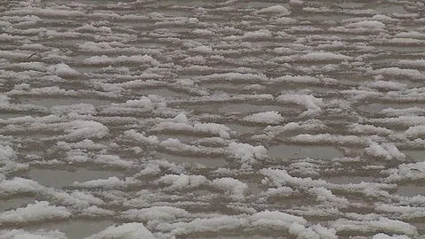 Snow and ice on the surface of the water Stock Footage 82865325