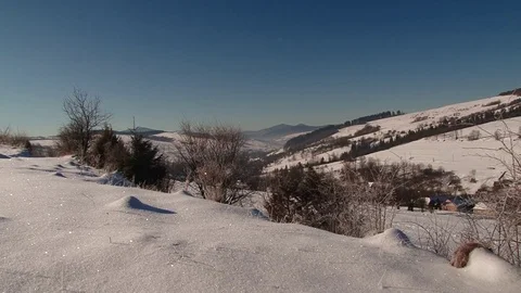 Snow and mountains behind Stock Footage 70363720