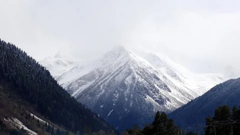 Snow and mountains Stock Photos