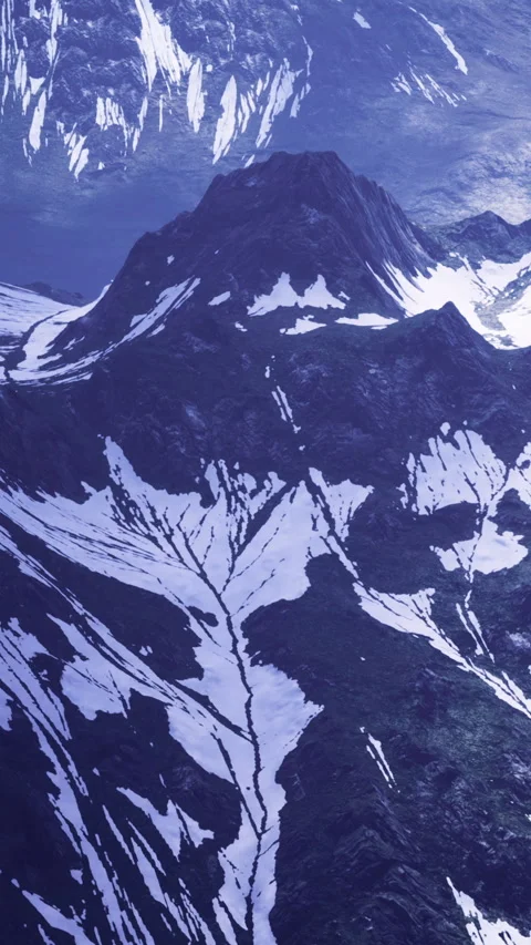 Snow and rock patterns on mountain slopes in a remote area during daylight Stock Footage 336188209