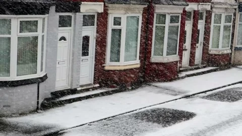 Snow And Wind On A Street With Small Houses 스톡 동영상 148222525
