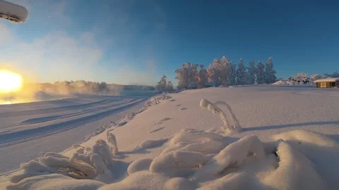 Snow Artic Circle fresh snowfall next to lake winter morning in Lapland epic Stock Footage 330921317