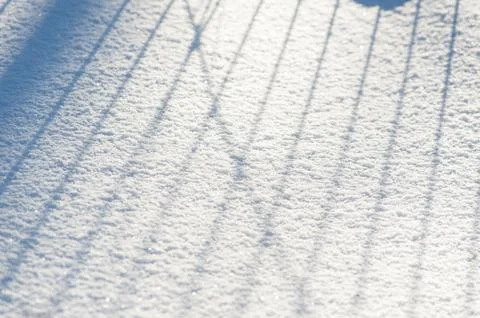 Snow background with blue shadows Stock Photos