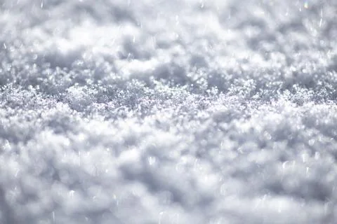 Snow background with cold surface. Snow texture in white pattern. Icy snow .. Stock Photos