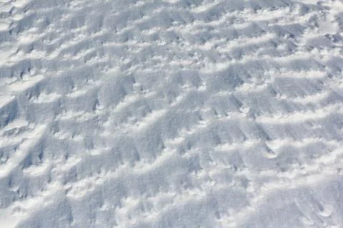 Snow background on a frozen river surface in the winter Stock Photos