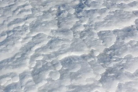 Snow background on a frozen river surface in the winter Stock Photos