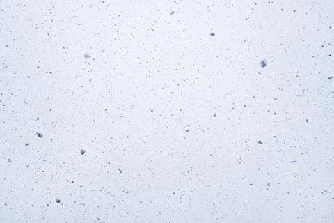 Snow on the background of the sky. Falling snow. Foto stock
