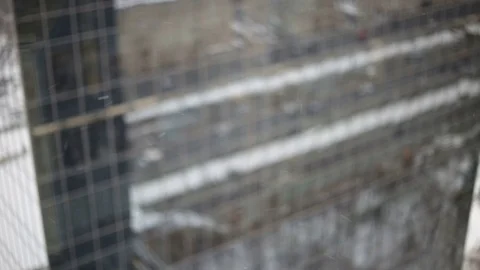 Snow on the background of a skyscraper Stock Footage 69986698