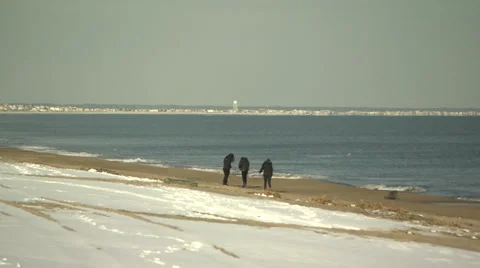 Snow beach walk Stock Footage 34456401