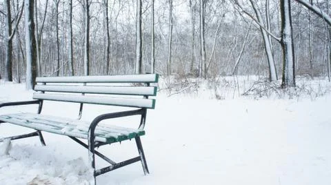 Snow on the bench in winter Stock Photos