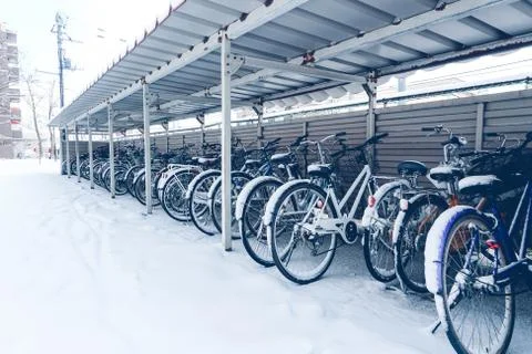 Snow on bicycle Stock Photos