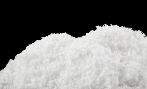 Snow on a black background close-up Stock Photos
