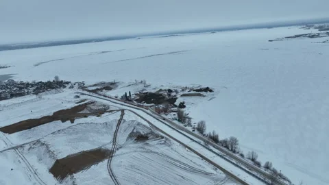 Snow blankets wide purification complex under dark sky Stock Footage 327806438