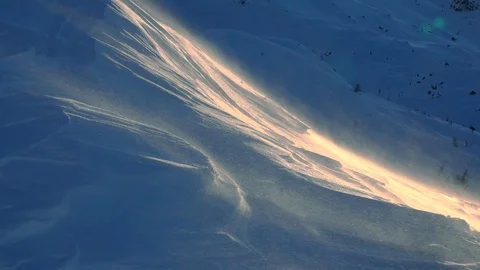 Snow blizzard in the mountain at sunset Stock Footage 127723618