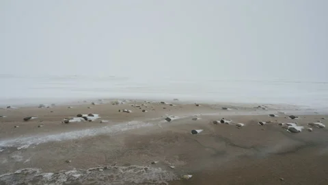 Snow blizzard on the seashore. Video stock 121083399