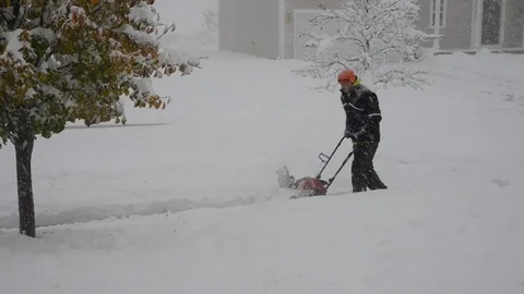 Snow Blower on Sidewalk Stock Footage 70262701